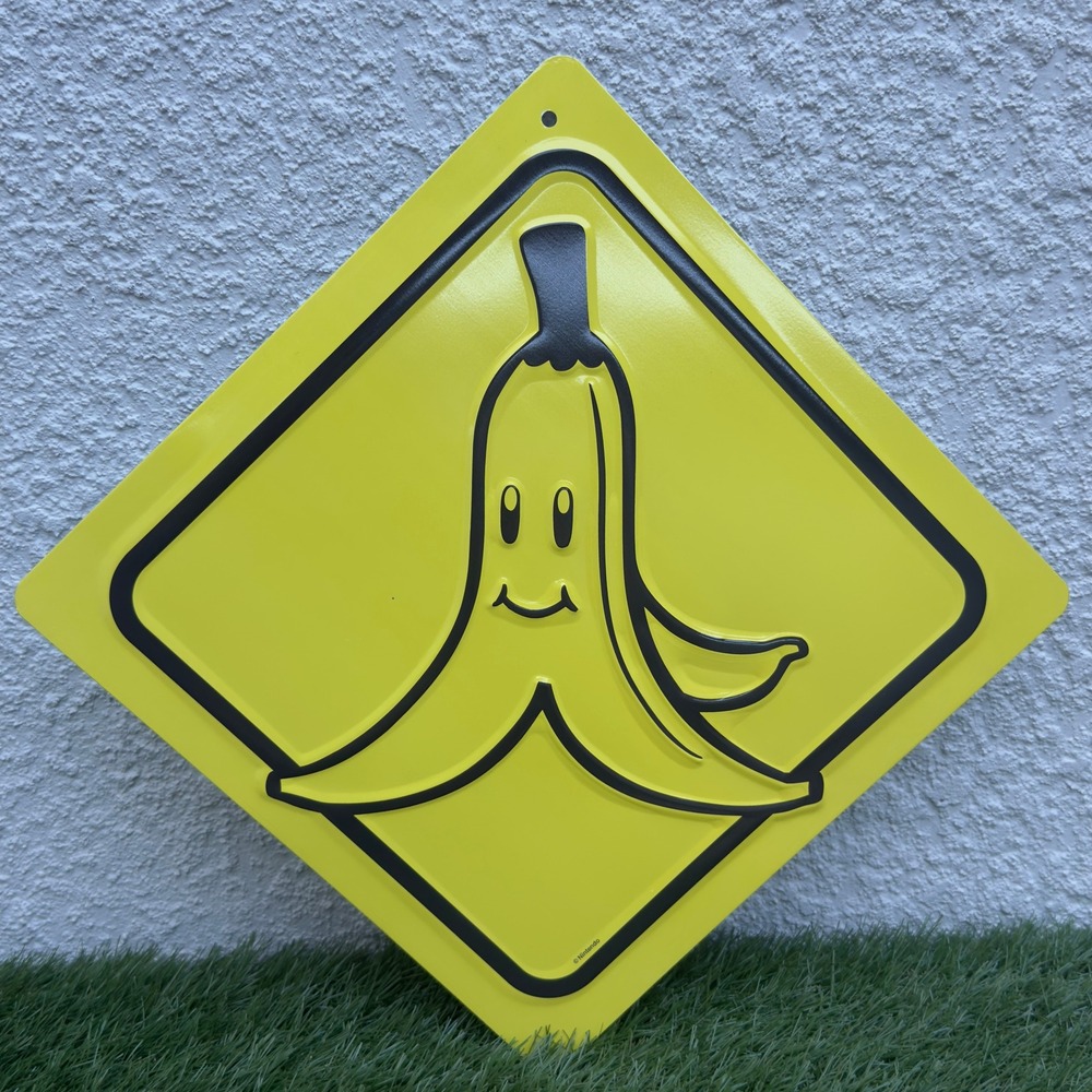 Nintendo Mario Kart Banana Peel Metal Sign Yellow Diamond Embossed Tin 12x12